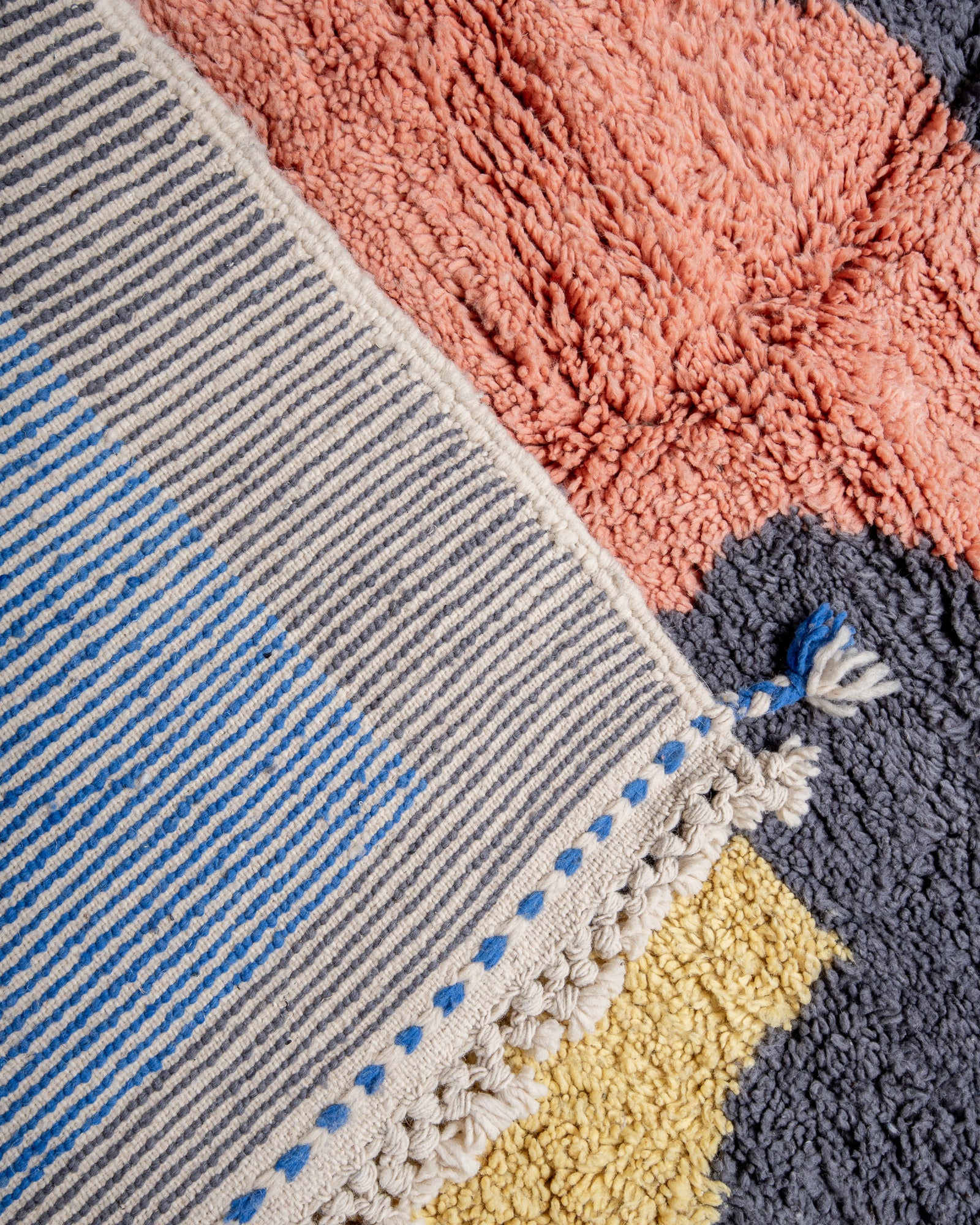 Modern, designer, handcrafted Berber rug from Morocco. Beniourain carpet with beautiful colours and patterns and fluffy wool texture.